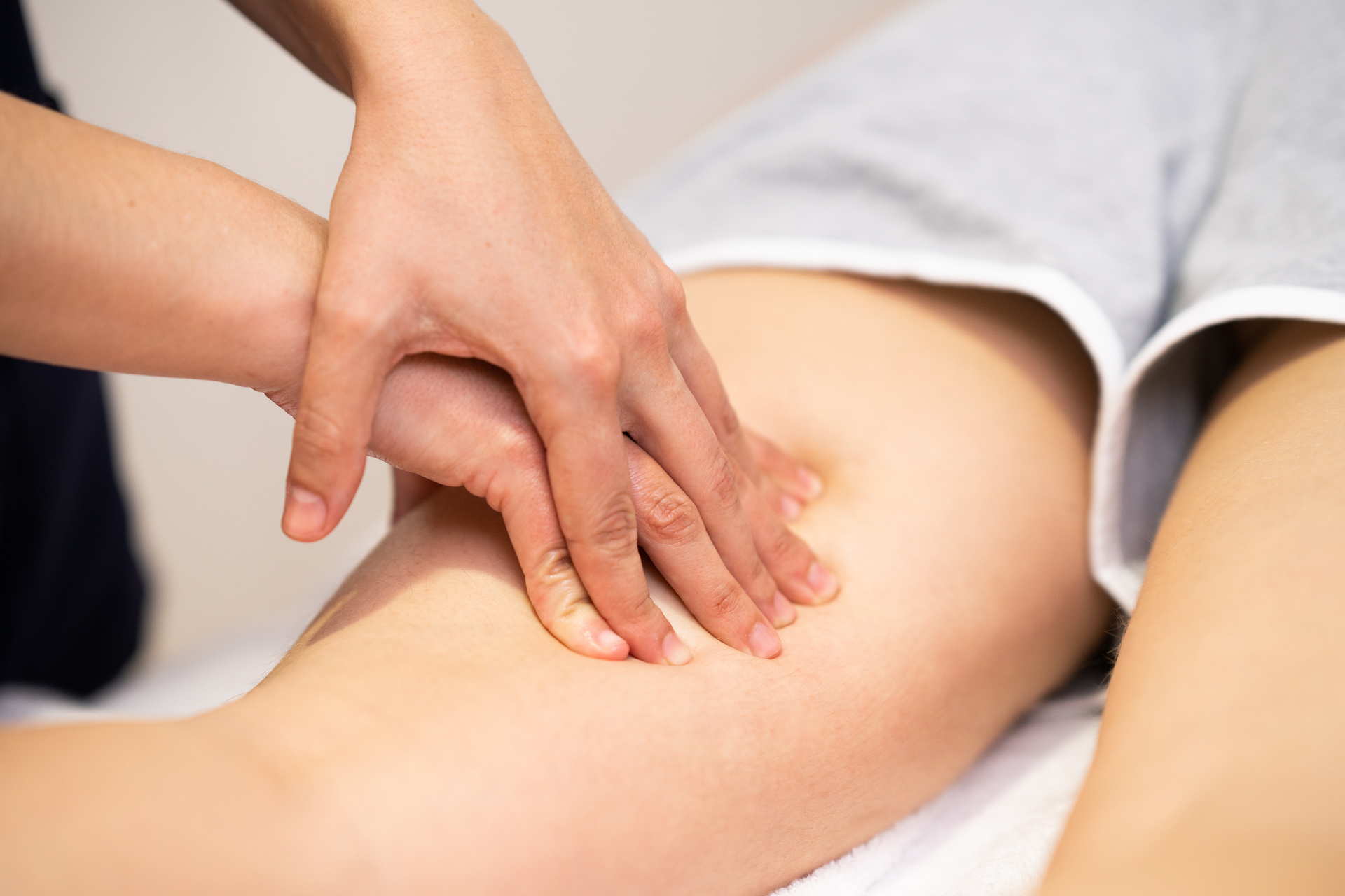 Physical therapy on a patient's lower leg