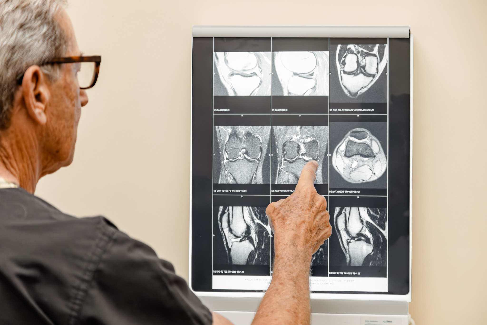 Dr. Scheinberg reviewing knee MRI images